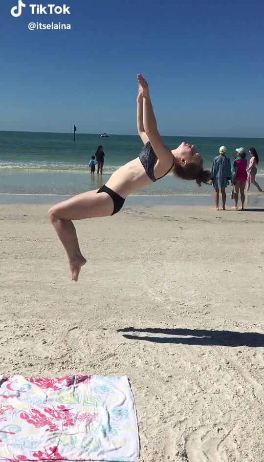 Sexy Elaina Rose In Bikini At The Beach While Doing Sports Exercises