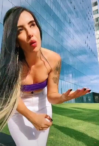 1. Sexy Adriana Valcárcel in Violet Tube Top in a Street