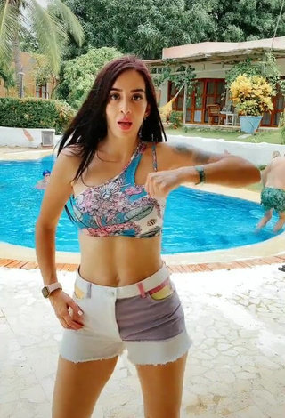 4. Desirable Adriana Valcárcel in Floral Bikini Top at the Swimming Pool