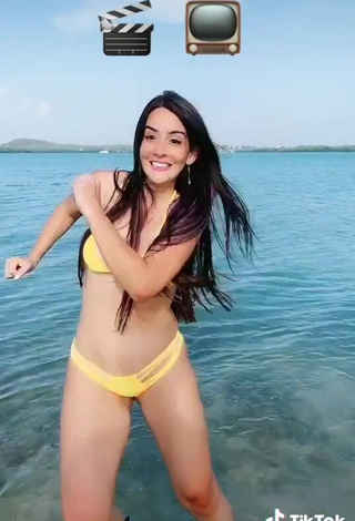 3. Cute Adriana Valcárcel in Yellow Bikini in the Sea