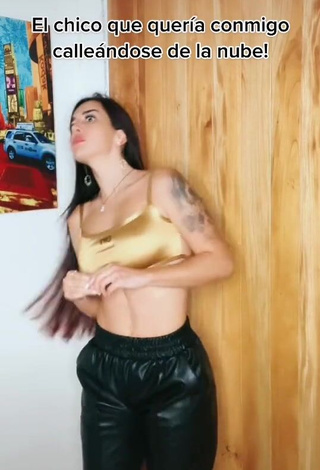 Cute Adriana Valcárcel in Golden Crop Top