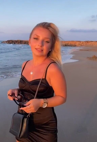 1. Sexy Alina Mour in Black Dress at the Beach