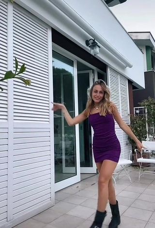 1. Hot Ambra Cotti in Violet Dress