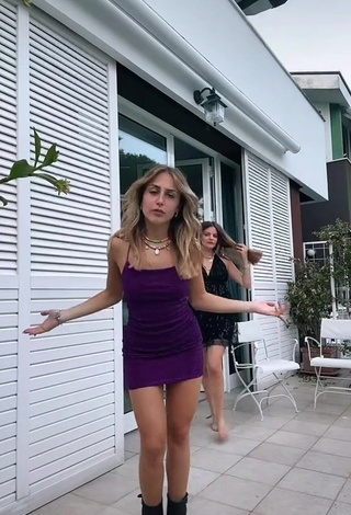 3. Hot Ambra Cotti in Violet Dress