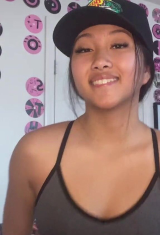 1. Sexy Anneston Pisayavong Shows Cleavage in Grey Sport Bra