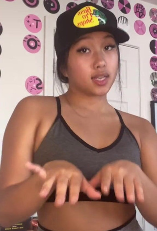 Sexy Anneston Pisayavong Shows Cleavage in Grey Sport Bra