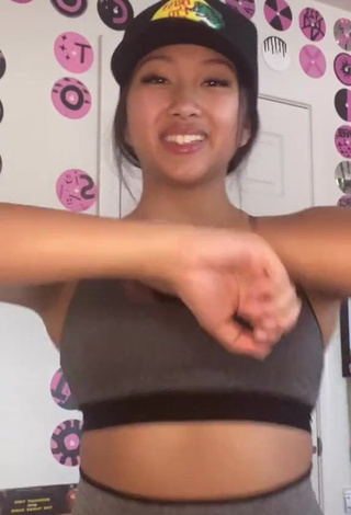 4. Sexy Anneston Pisayavong Shows Cleavage in Grey Sport Bra