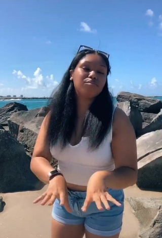 4. Hot Asha Christine in White Crop Top at the Beach