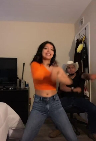 Cute Ashley Valdez in Orange Crop Top