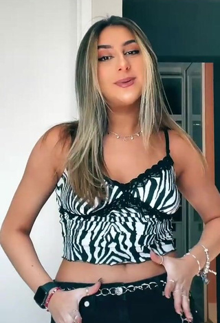 1. Desirable Bia Herrero in Zebra Top