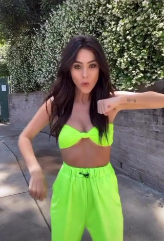 3. Sexy Brooke Bridges Shows Cleavage in Lime Green Crop Top