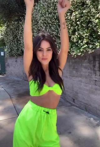 4. Sexy Brooke Bridges Shows Cleavage in Lime Green Crop Top