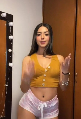 Cute Adriana Carballo in Orange Crop Top