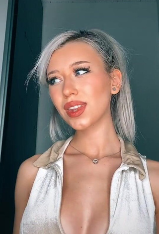 Sweetie Alexis Feather Shows Cleavage in Silver Crop Top