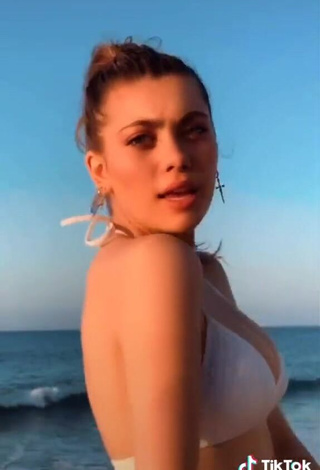 3. Hot Amelie Zilber Shows Cleavage in White Bikini Top in the Sea