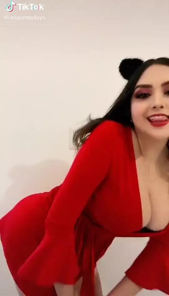 Desirable Abril Abdamari Garza Alonso Shows Cleavage in Red Overall