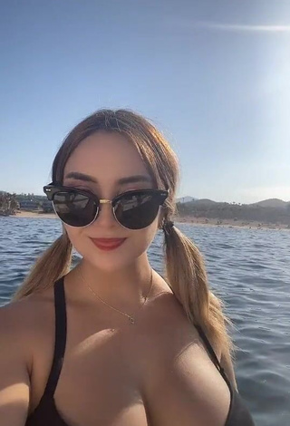 3. Hot Abril Abdamari Garza Alonso Shows Cleavage in Black Bikini Top on a Boat