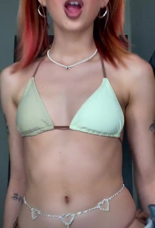 1. Sexy Ariana Renee in Beige Bikini Top