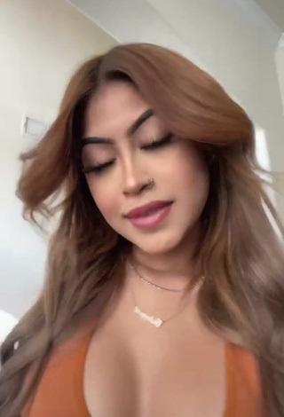 3. Hottest Desiree Montoya Shows Cleavage in Orange Crop Top