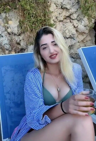 1. Cute Eda Aslankoç Shows Cleavage in Olive Bikini Top