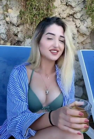 3. Cute Eda Aslankoç Shows Cleavage in Olive Bikini Top