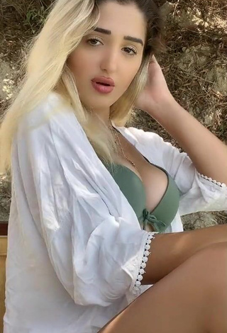 1. Desirable Eda Aslankoç Shows Cleavage in Olive Bikini Top