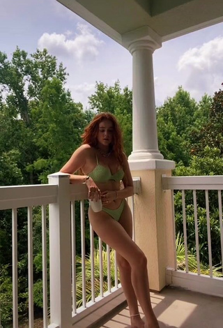 3. Beautiful Faith Collins in Sexy Green Bikini on the Balcony