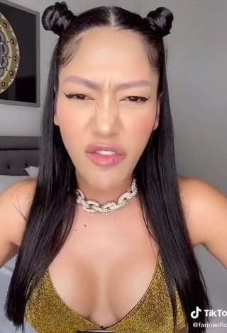 3. Sexy Farina Shows Cleavage in Golden Bikini Top