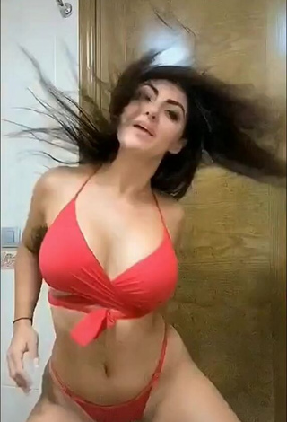 3. Erotic Franjomar Shows Cleavage in Red Bikini