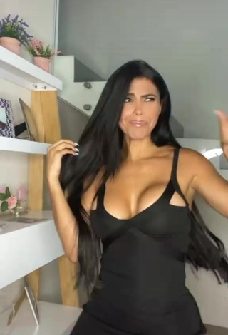 1. Beautiful Franjomar Shows Cleavage in Sexy Black Dress