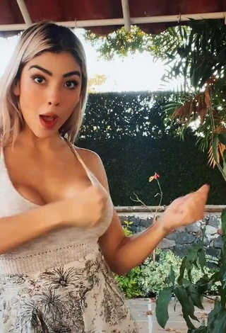 Hot Frida Ximena Shows Cleavage in Grey Top