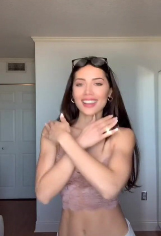 3. Cute Georgina Mazzeo Shows Cleavage in Beige Crop Top