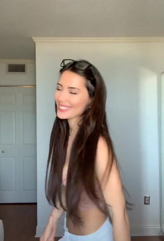 Sexy Georgina Mazzeo Shows Cleavage in Beige Crop Top