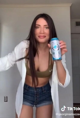 3. Wonderful Georgina Mazzeo Shows Cleavage in Olive Crop Top