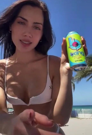 1. Alluring Georgina Mazzeo Shows Cleavage in Erotic White Bikini at the Beach