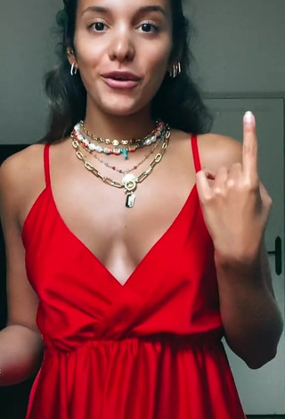 3. Sexy Iris Ferrari Shows Cleavage in Red Dress