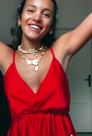 4. Sexy Iris Ferrari Shows Cleavage in Red Dress