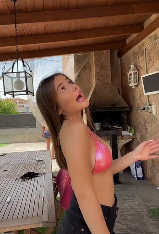 Hot Isabelli Brunelli Shows Cleavage in Pink Bikini Top