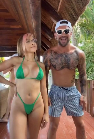 1. Hot Maddy Belle Shows Cleavage in Green Mini Bikini