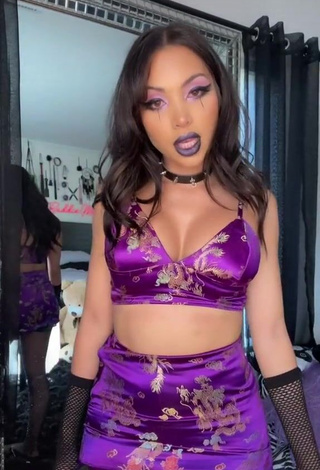 Sweet Maddy Belle Shows Cleavage in Cute Violet Crop Top