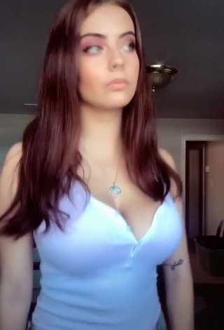 1. Hot Julia Burch Shows Cleavage in White Top