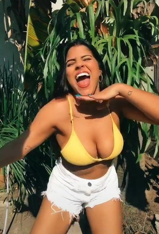 3. Sensual Julia Antunes Shows Cleavage in Yellow Bikini Top