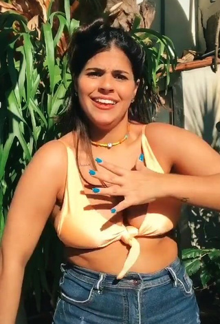 3. Julia Antunes Shows Cleavage in Inviting Yellow Bikini Top and Bouncing Big Tits