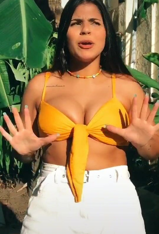 1. Magnetic Julia Antunes Shows Cleavage in Appealing Yellow Bikini Top