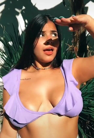 1. Julia Antunes Shows Cleavage in Sweet Purple Bikini Top