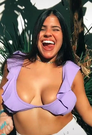 4. Julia Antunes Shows Cleavage in Sweet Purple Bikini Top