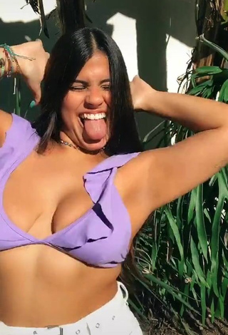 4. Wonderful Julia Antunes Shows Cleavage in Purple Bikini Top