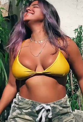 1. Sweet Julia Antunes Shows Cleavage in Cute Yellow Bikini Top