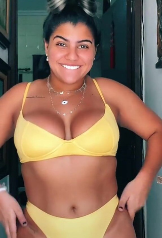 Gorgeous Julia Antunes Shows Cleavage in Alluring Yellow Bikini