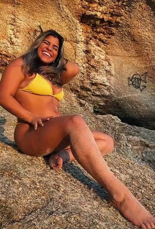 1. Seductive Julia Antunes Shows Cleavage in Yellow Bikini at the Beach